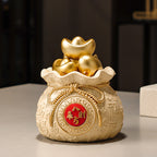 Golden Money Bag Statue