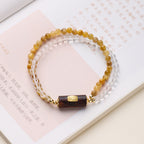 Pulsera de la Riqueza Lu Lu Tong de Rutilo Dorado y Madera