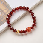 Pulsera de la riqueza con granate rojo vino y cuarzo hematóide
