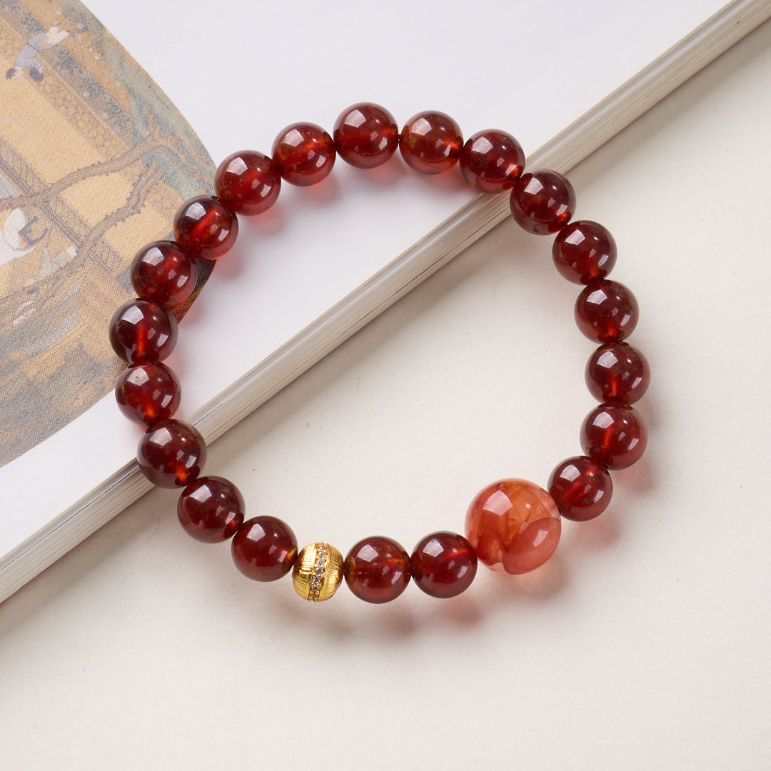 Pulsera de la riqueza con granate rojo vino y cuarzo hematóide