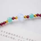 Deep Red Granat- & Aquamarin-Reichtumsarmband