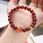 Pulsera de la riqueza con granate rojo vino y cuarzo hematóide