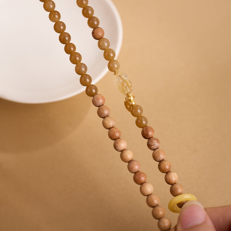 Bracelet de richesse Pixiu en bois de santal doré rutile