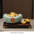 Golden Money Bag Statue