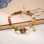 Pulsera trenzada de oro vermeil con múltiples gemas