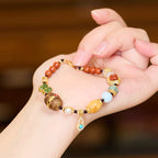 Pulsera trenzada de oro vermeil con múltiples gemas