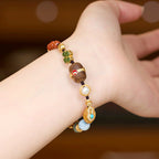 Pulsera trenzada de oro vermeil con múltiples gemas