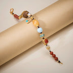 Pulsera trenzada de oro vermeil con múltiples gemas